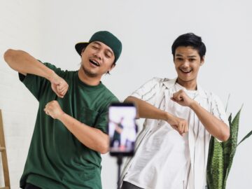 Friends dancing tiktok, recording by smartphone